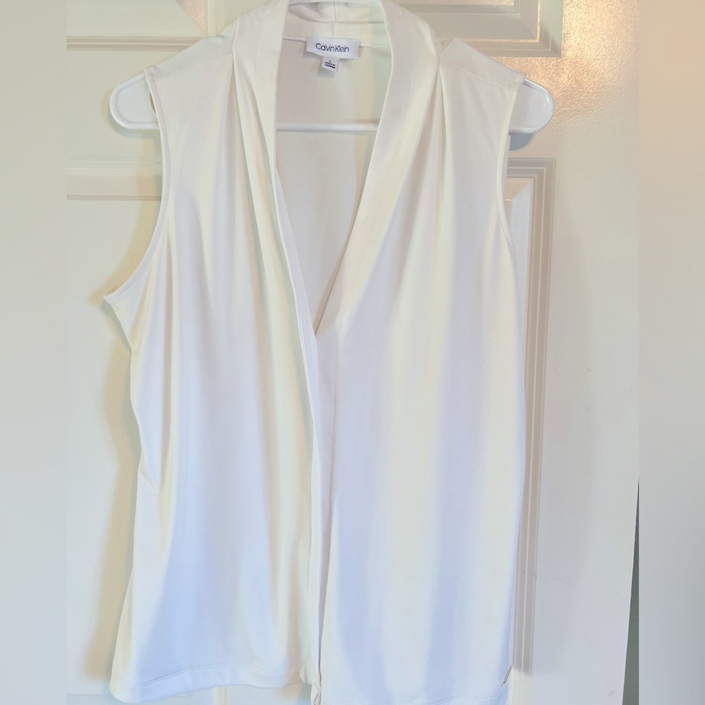 Women’s Calvin Klein sleeveless spandex white top.